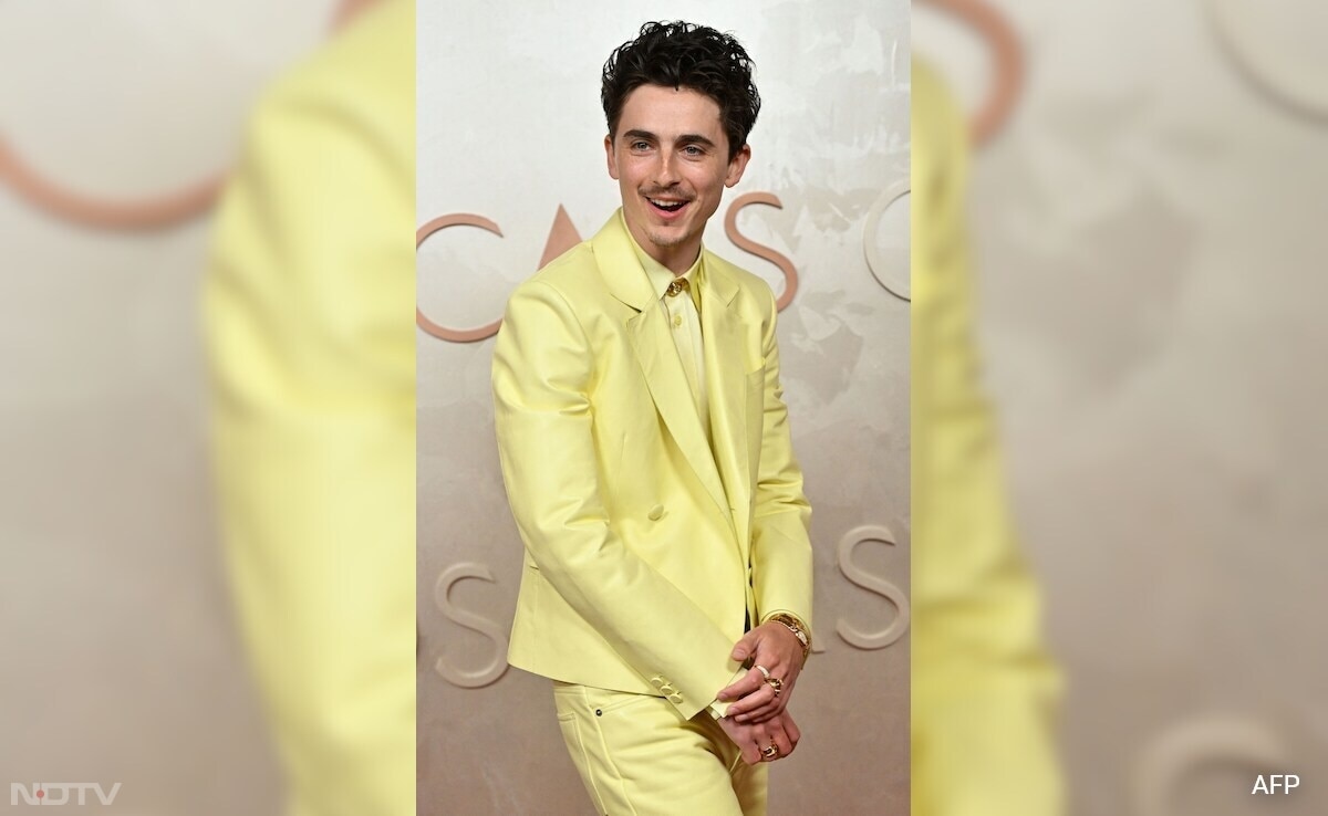 Timothee Chalamet wore a butter yellow suit by Givenchy. (Image Courtesy: AFP)