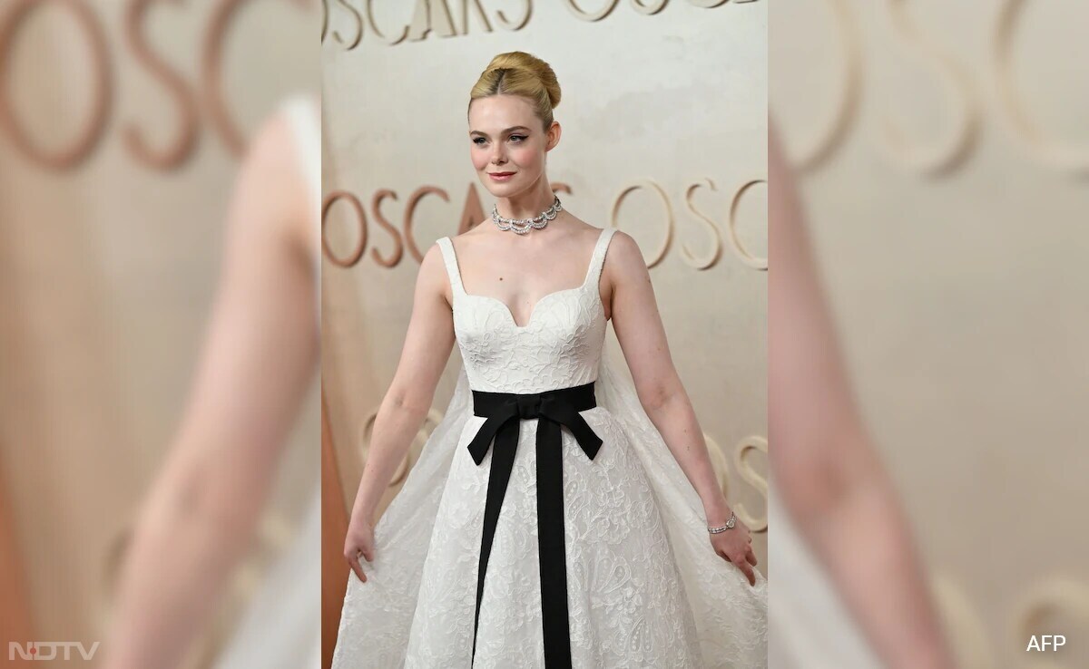 Elle Fanning looked like a modern day princess in a custom Givenchy gown. (Image Courtesy: AFP)