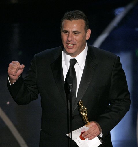 Producer Graham King accepts the Oscar after the film The Departed won best motion picture of the year at the 79th Academy Awards