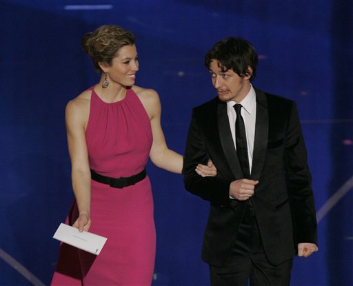 Jessica Biel, left, James McAvoy present a Oscar for achievement in sound mixing during the 79th Academy Awards