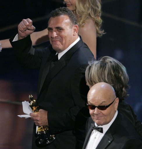 Producer Graham King celebrates with Diane Keaton and Jack Nicholson after accepting the Oscar after the film The Departed won best motion picture of the year at the 79th Academy Awards