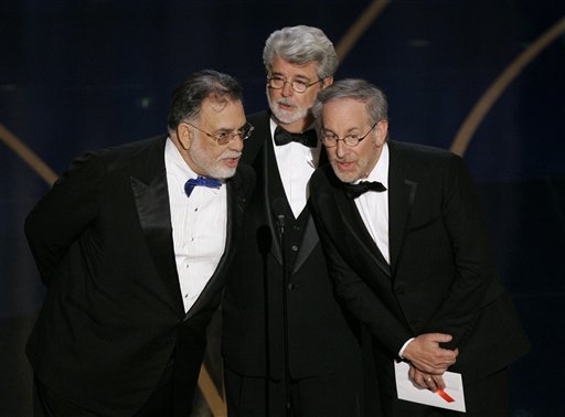 Directors Steven Spielberg, from right, George Lucas and Francis Ford Coppola present the Oscar for best director to Martin Scorsese, not pictured, for his work on The Departed during the 79th Academy Awards