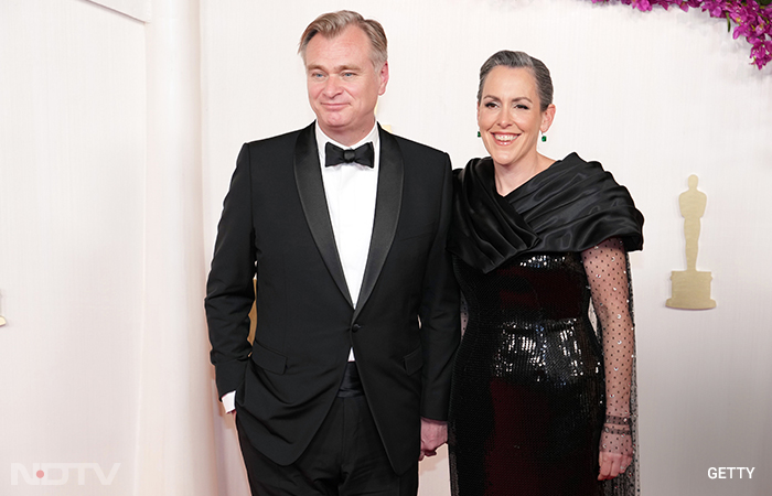 Power couple Christopher Nolan and Emma Thomas understood the assignment. (Image courtesy: Getty)