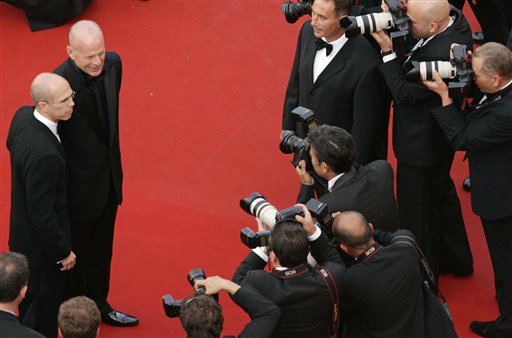 American actor Bruce Willis, left top, and Jeffrey Katzenberg, president of Dreamworks Animation Studios, pose together as they arrive for the screening of the film Over the Hedge, at the 59th International film festival in Cannes, southern France.