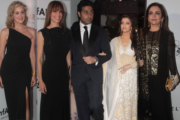 amfAR Gala on November 17<br>
The first ever Indian amfAR event was co-hosted by Hollywood star Sharon Stone and Bollywood it couple Aishwarya and Abhishek Bachchan. The star-studded affair was held at Mumbai's Taj Mahal Hotel and drew an exciting line up of high profile guests including Million Dollar Baby actress Hilary Swank as well as the cream of India's elite.<br><br>
The glamorous and glittering cocktail reception included dinner and a fashion show with creations by designers Abu-Sandeep, Rohit Bal and Tarun Tahiliani. International pop singer Ke$ha performed at the show.