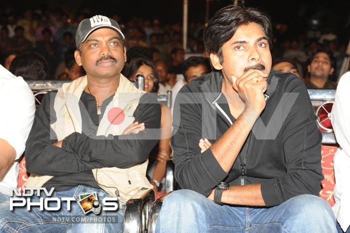 Pawan Kalyan and Karunakar watch the proceedings of the show.