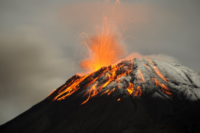 View from Palitahua, Ecuador on May 29, 2010, of the Tungurahua volcano in eruption. Tungurahua volcano exploded into action on Friday, forcing the evacuation of at least seven villages and closing down the airport and public schools in Guayaquil, the country's largest and most populated city. (Photo: AFP)