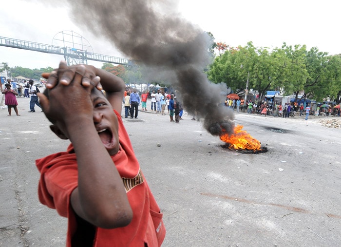 Haitian students demonstrate on May 25, 2010 near the presidential palace in Port-au-Prince against alleged violence by UN peacekeepers against Haitian students on May 24. The students demanded the UN leave Haiti. (Photo: AFP)