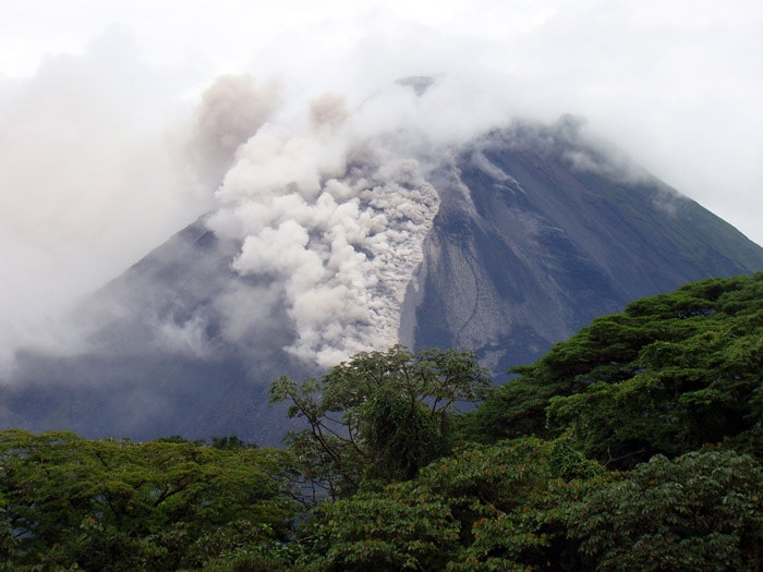 Costa Rica's Arenal volcano spews geysers of lava, ash and toxic gases from its crater on May 24, 2010 in the Arenal National Park, 80 km northeast of San Jose. The 1,633-metre-tall cone-shaped mountain shuddered into activity at midday, issuing eight successive rivers of lava that flowed down its steep slopes and forcing the evacuation of the national park in northern Costa Rica where it is located, authorities said. (Photo: AFP)