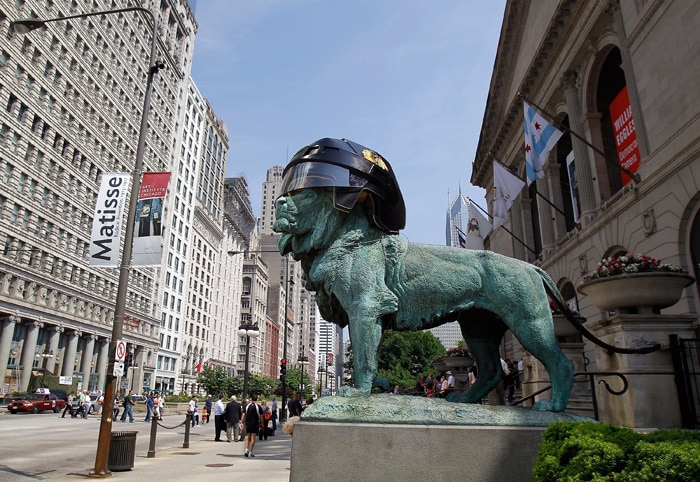 A lion sculpture sports a Chicago Blackhawks helmet in celebration of the Blackhawks appearence in the Stanley Cup Finals against the Philadelphia Fylers at the Art Institue of Chicago on May 26, 2010 in Chicago, Illinois. The lion sculptures, by artist Edward L. Kemeys, were installed at the Michigan Avenue entrance to the museum in 1894. (Photo: AFP)