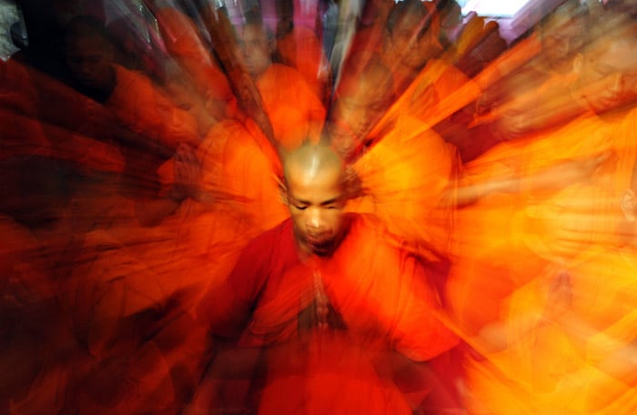 Young Buddhist monks participate in a special prayer to celebrate Buddha Jayanti (Birth Anniversary of Lord Buddha) at the Maha Bodhi Society in Bangalore on May 27, 2010. Buddhists commemorate the birth of Buddha, his attaining enlightenment and his passing away on the full moon day of May which falls on May 27 this year. (Photo: AFP)