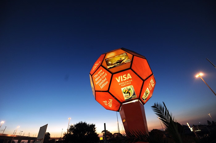 A glass football ball, bearing advertising, greets visitors on May 26, 2010 outside the O. R. Tambo international airport in Johannesburg. The 2010 FIFA World Cup starts on June 11 in South Africa. (Photo: AFP)