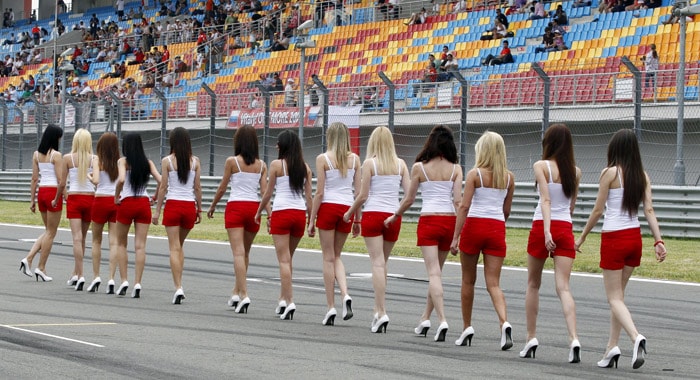 Models walk on the starting grid after the third free practice ahead of the Turkish Formula One Grand Prix at the Istanbul Park circuit racetrack, in Istanbul, Turkey, on Saturday, May 29, 2010. The Formula one race was held on Sunday. (Photo: AP)