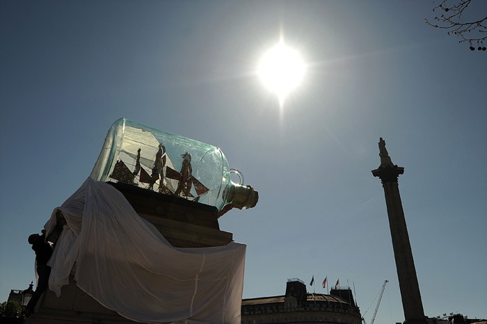 An artwork entitled 'Nelson's Ship in a Bottle' by Anglo-Nigerian contemporary artist Yinka Shonibare is unveiled on the fourth plinth in Trafalgar Square in London, on May 24, 2010. The artwork featues a large scale model of the ship HMS Victory, from which Horatio Nelson commanded the Battle of Trafalgar in 1805. (Photo: AFP)