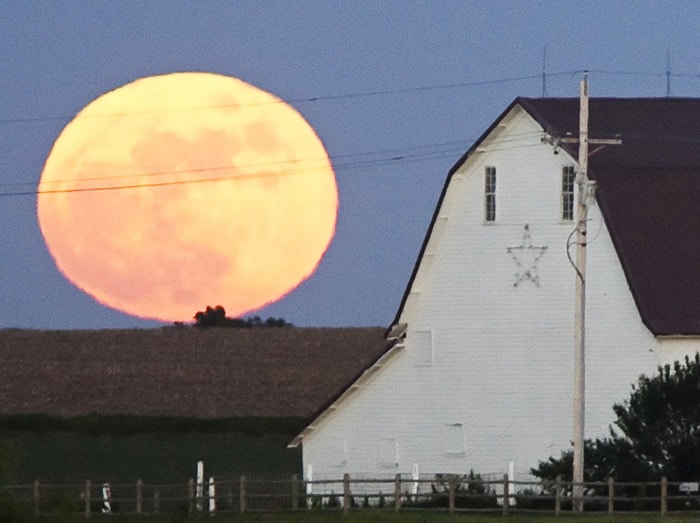 A full moon rises over a farm in Ashland, Nebraska, on Thursday, May 27, 2010. (Photo: AP)