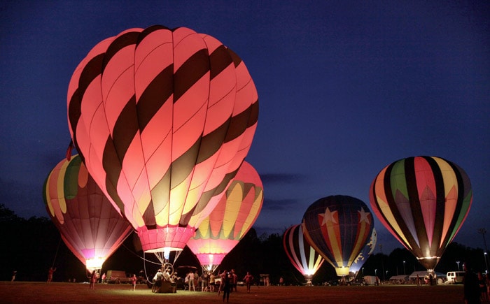 Hot air balloons light up at night at the annual Balloon Glow during the Blossom Time Festival in Chagrin Falls, Ohio on Thursday, May 27, 2010. (Photo: AP)