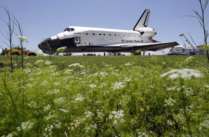 The space shuttle Atlantis is towed towards the orbiter processing facility on Wednesday, May 26, 2010, at the Kennedy Space Center in Cape Canaveral, Florida. Atlantis and her crew of six astronauts wrapped up a 12-day mission. (Photo: AP)