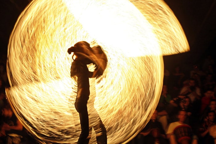 In this photo taken on Sunday, May 23, 2010, a performer with fire sparks, during a traditional fire-show, in Minsk, Belarus. (Photo: AP)