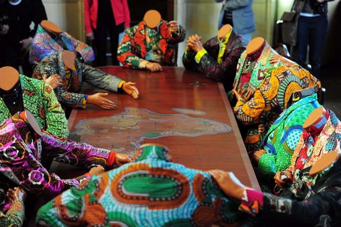 The installation 'Scramble for Africa' by British artist of Nigerian origin Yinka Shonibare is pictured during a press preview of the exhibition 'Who Knows Tomorrow' on June 2, 2010 at the Friedrichswerdersche Kirche in Berlin. The exhibition can be visited from June 4 till September 26, 2010. (Photo: AFP)