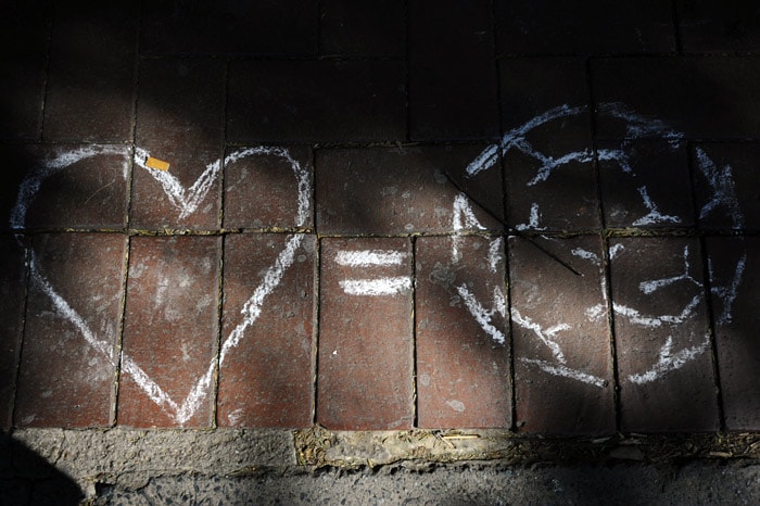 Football graffiti are seen on a pavement in a shopping centre on June 4, 2010 in Johannesburg, South Africa. The FIFA WC2010 will take place in South Africa from the 11 of June to the 11 of July. (Photo: AFP)