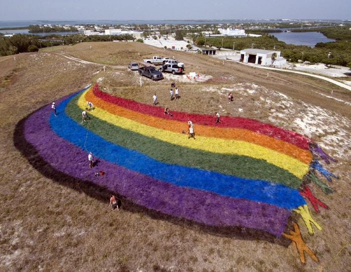 Landscape 'artists' put finishing touches on a giant rainbow flag on the top of a dormant landfill, nicknamed Mount Trashmore, on Friday, June 4, 2010, in Key West, Florida. The gay-and-lesbian pride icon measures about 125 feet by 60 feet and was spearheaded by local landscaper John Mumford and artist Rick Worth. It was created to highlight Key West's annual PrideFest celebration, set for June 9-13. (Photo: AFP)