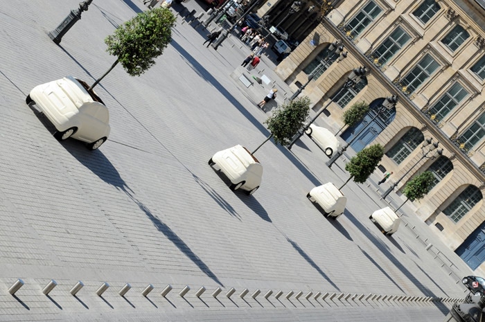 Five fiberglass sculptures from Italian architect and designer Fabio Novembre, inspired by the Fiat 500C model and contain a planted tree, are exhibited on the prestigious Place Vendome in Paris, on June 4, 2010. The exhibition, named 'Un Arbre pour l'Espoir' (A Tree for Hope) will be displaying 12 sculptures from Fabio Novembre, from June 3 to June 29, 2010. Since 2005, Designing Hope uses contemporary art as a tool to create awareness in its fight against HIV and AIDS related discrimination. (Photo: AFP)