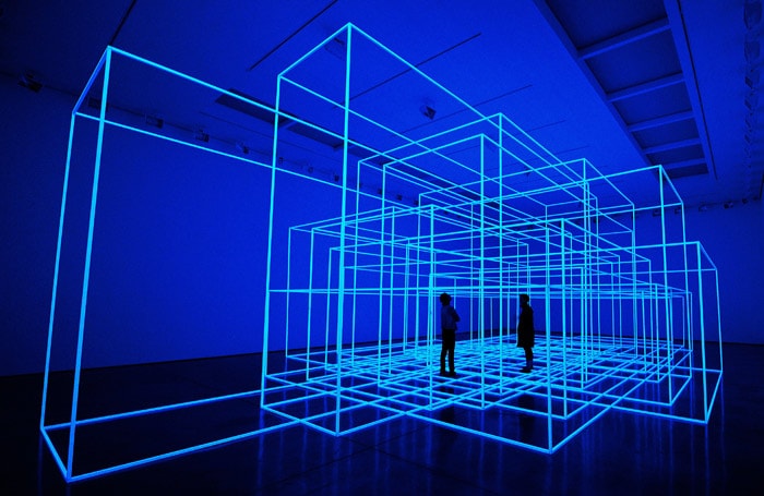 People pose for photogrpahers in British artist Antony Gormley's new installation, Breathing Room III, during a photocall for his new exhibition 'Test Sites' at the White Cube Gallery, in London on June 3, 2010. The exhibition is set to run until July 4. (Photo: AFP)