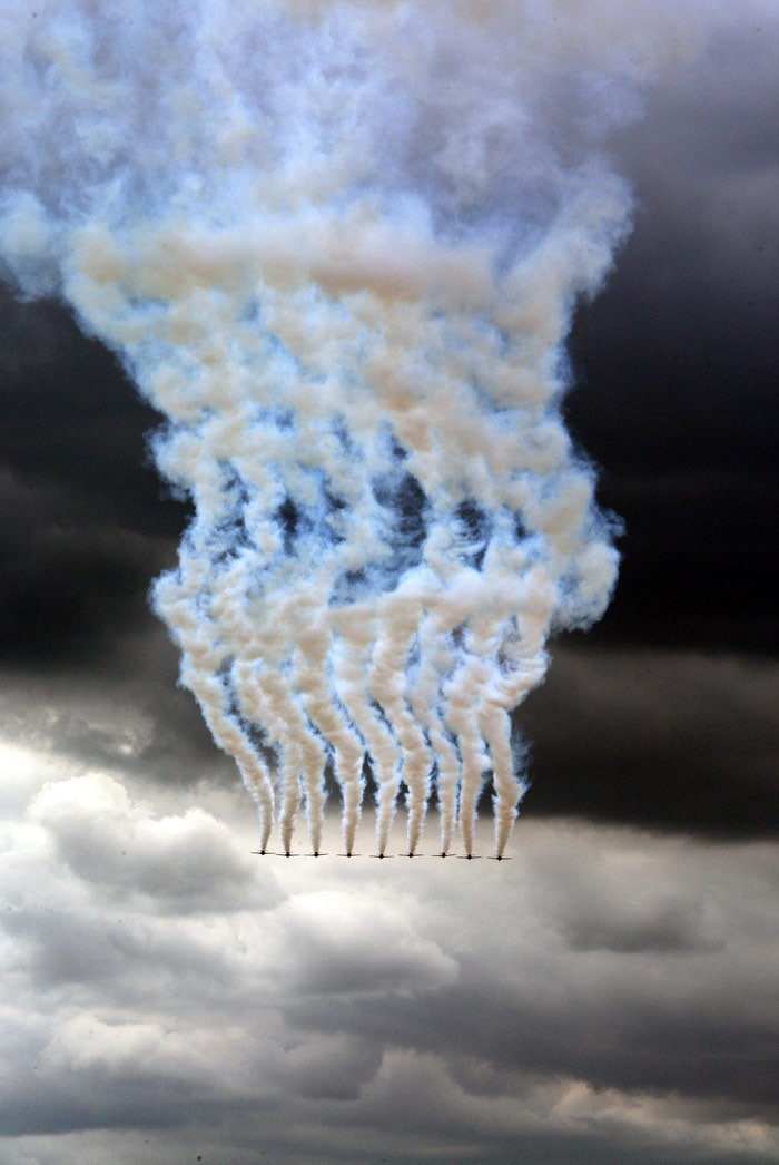 The Royal Air Force display team the Red Arrows fly over central London, on Tuesday July 6, 2010, during a parade of military cadets. The parade was part of a day of national celebrations to mark the 150th anniversary of the founding of Britain's Cadet Forces. (Photo: AP)