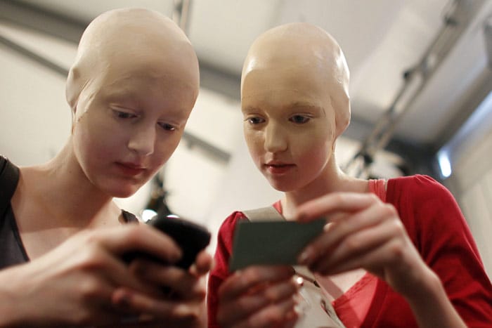 Model Michaela Kurzova, left, talks to an other unidentified model during preparations for the Spring/Summer 2011 fashion show of German designer Patrick Mohr at the Berlin Fashion Week on Friday, July 9, 2010. (Photo: AP)