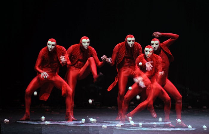 A multiple exposure picture shows a member of Cirque le Masque from the US perform on stage during the Indonesian International Circus Festival in Jakarta on July 5, 2010. The International Circus Festival includes circus from China, the US and Europe and was held in Jakarta from July 2 - 11. (Photo: AFP)