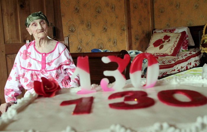 Picture taken on July 8, 2010 shows Georgian woman Antisa Khvichava resting during her 130th birthday party in the village of Sachino, some 370 km west of Tbilisi. Khvichava is purported to be the oldest person in the world. (Photo: AFP)