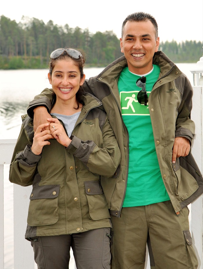 Bollywood actress Manisha Koirala (L) and her new husband, Nepalese businessman Samrat Dahal pose in Sievi, Finland on July 7, 2010. The couple is spending their honeymoon in Sievi, Finland. (Photo: AFP)