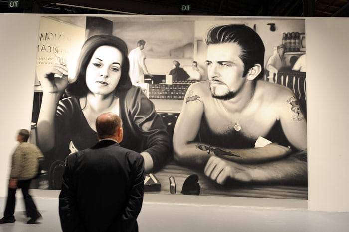 A visitor looks at an oil on vinyl painting called "Biker Couple" at the press preview of "Dennis Hopper: Double Standard," the first US comprehensive museum survey of the works of the actor/artist/director, July 9, 2010 at the Museum of Contemporary Art (MOCA) in Los Angeles. Best known for his work in cinema, including the 1969 film classic "Easy Rider, the show traces the evolution of Hopper's artistic output in a variety of medium and features more than 200 works spanning his prolific 60-year career including photography, painting, sculpture, film, installations and found art. (Photo: AFP)