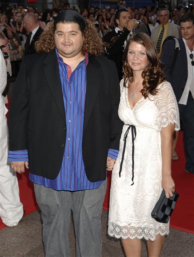 US actor Jorge Garcia arrives with his companion Malia Hansen  for the European Premiere of Pirates of the Caribbean: Dead Man's Chest, at the Odeon Cinema in Leicester Square.