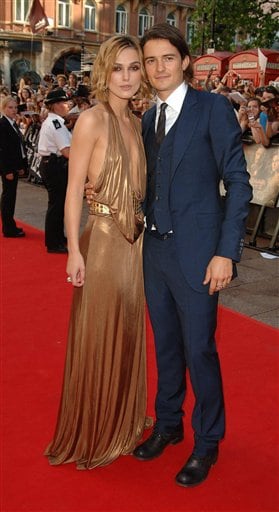 British actress Keira Knightley, left, arrives with British actor Orlando Bloom for the European Premiere of Pirates of the Caribbean: Dead Man's Chest, at the Odeon Cinema in Leicester Square.