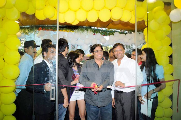 Producer Vashu Bhagnani looks delighted to cut the ribbon.