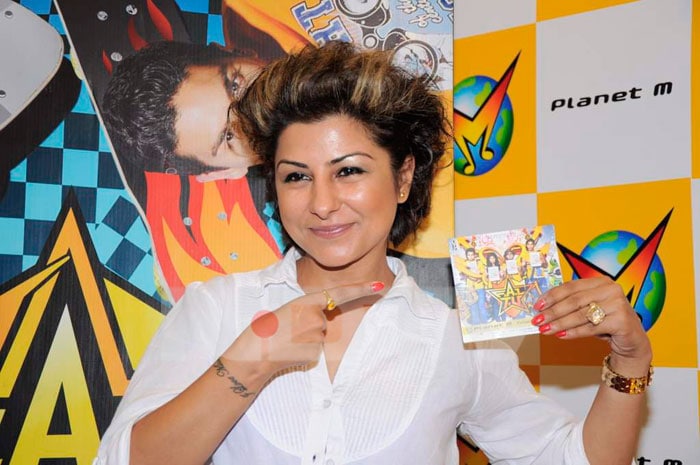 Hard Kaur flaunts the music CD of the movie.