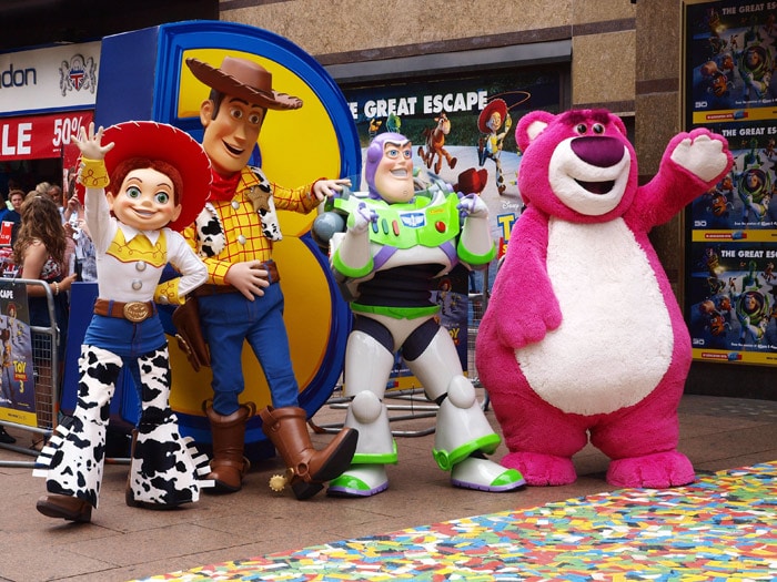 The four main characters (L-R), Jessie, Woody, Buzz, and the new one Lot's-O'-Huggin Bear arrive in London's Leicester Square on July 18, 2010 for the British Premiere of their Pixar/Disney film, <i>Toy Story 3</i> in 3D. (Photo: AFP)