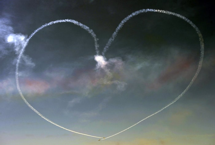 The Spanish Eagle Patrol team performs in Vigo, northwestern Spain, on July 18, 2010, during the International Vigo Airshow. (Photo: AFP)