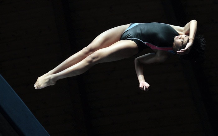 Traisy Vivien Tukiet from Malaysia competes in the platform final at the 16th FINA Diving Grand Prix in Madrid, on Sunday, July 18, 2010. (Photo: AP)