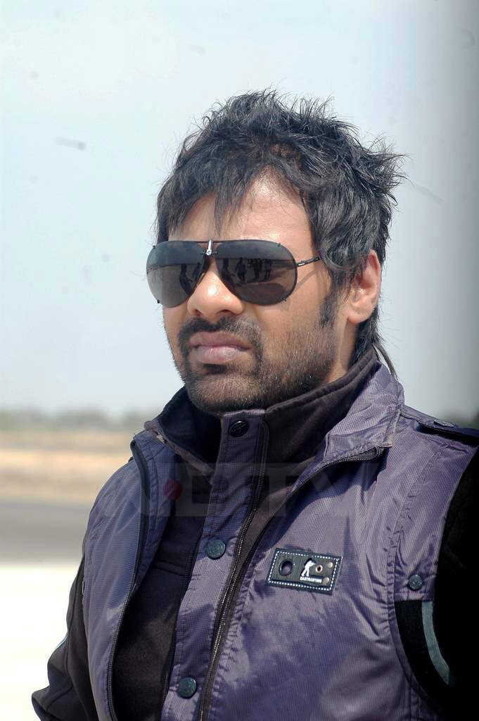 Shabbir looks all cool in his glares even in the bright sunlight. Shabbir's jackets enhance his hunk look!