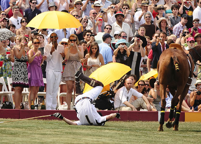 Prince Harry takes a tumble