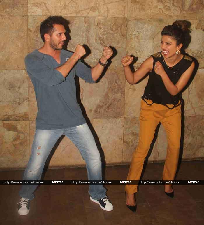 Bollywood actress Priyanka Chopra, who is riding high on the success of her film <i>Mary Kom</i>,  organised a special screening of the film for her friends in Mumbai on September 10.<br><br>
In this picture, Priyanka boxes with Ritesh Sidhwani, who is producer of her upcoming film <i>Dil Dhadakne Do</i>.