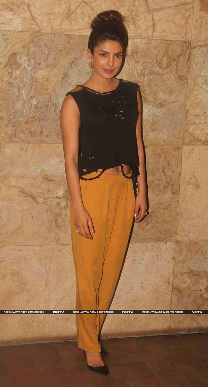 Priyanka looked elegant in a cropped black top, worn with mustard  trousers.