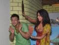 Photo : Mallika takes a rolling pin to Vivek