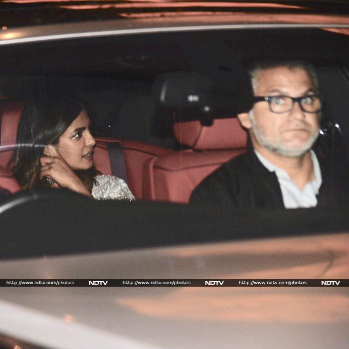 For the evening, Priyanka picked an embellished <I>saree</i> from the studios of Tarun Tahilani. Black curtains in the backseat of her car ensured the privacy is maintained.