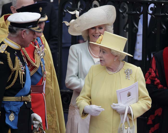 Queen Elizabeth II chats with Camilla, Duchess of Cornwall, Prince Philip and Prince Charles, as they leave Westminster Abbey.