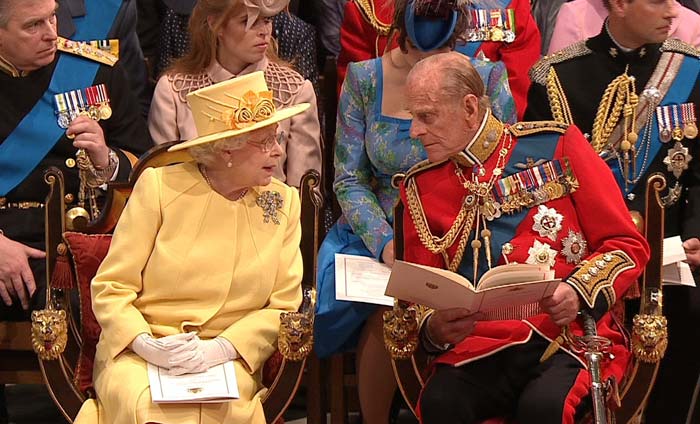 Queen Elizabeth II sits with the Duke of Edinburgh at Westminster Abbey.  The British press have often said that at 85 and 89, the romance between them remains as strong as ever.