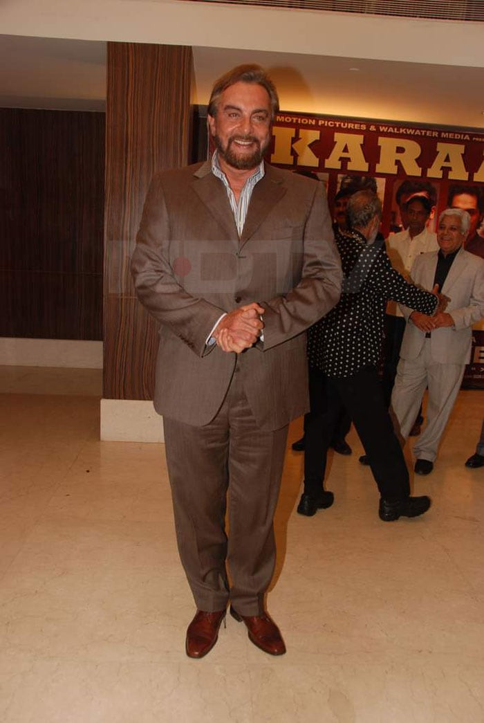 Dashing Kabir Bedi arrives at the bash.