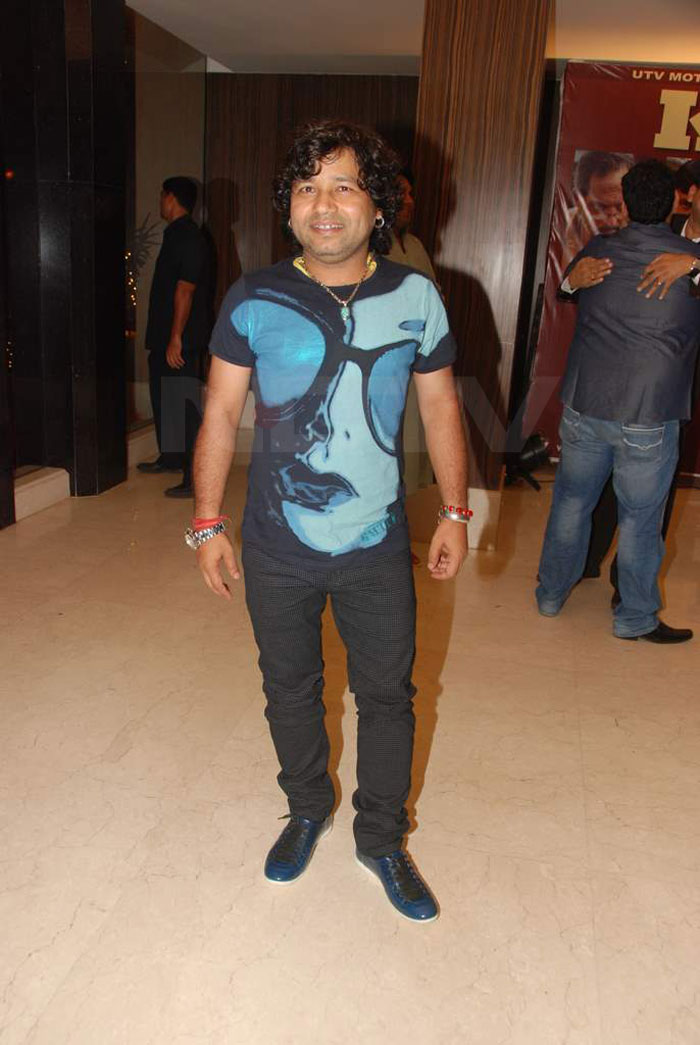 Singer Kailash Kher poses for the camera in a funky t-shirt.